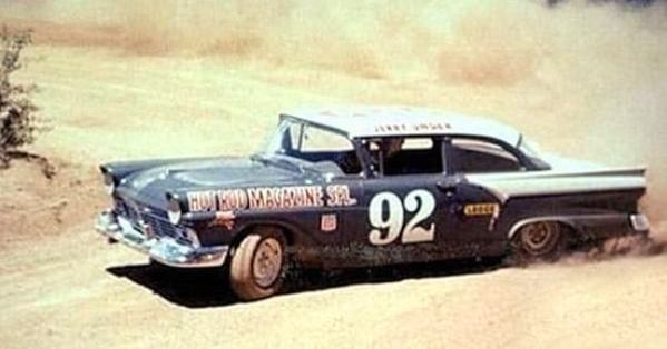 CHAMPION 1956 BOB UNSER Races Car Up PIKES PEAK Mountain Road VINTAGE AD